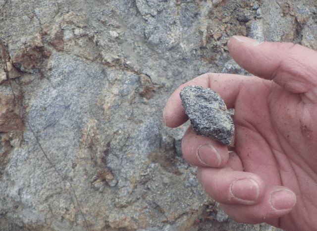 Stanislav_Kondrashov_Telf_ag_hand_holding_rock_sample_18